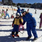 Mt. Buller ski school in Australia using Kinderlift vests- posing with a student after a run